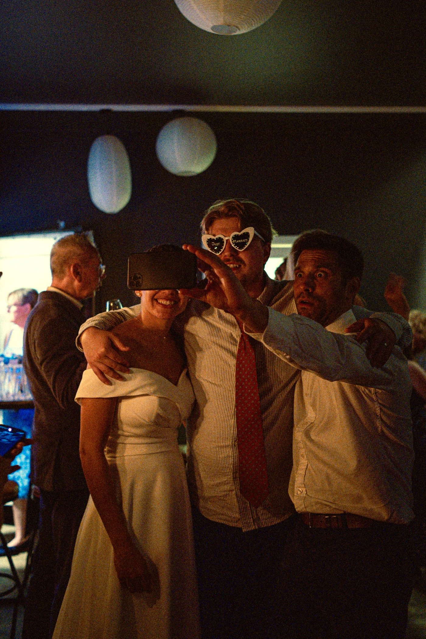 Friends taking a selfie at a party