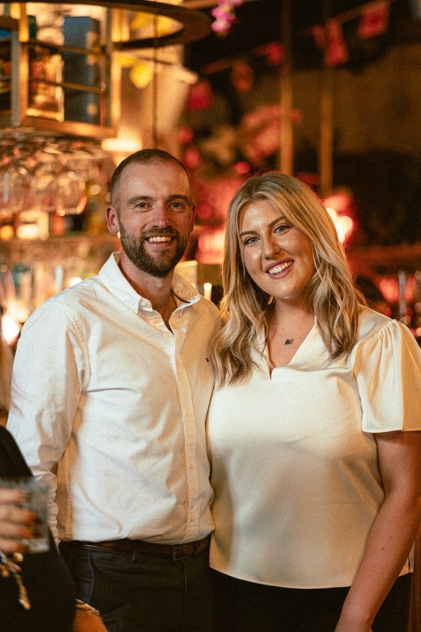 Couple smiling at an event